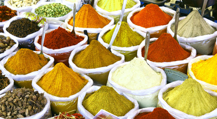 Various asian spices on sale at an outdoor market