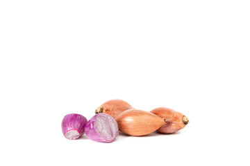 Onion shallot on a white background. Eating vegetables and eating healthy. Eating shallots, adding to various dishes, diversifying food.