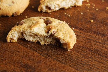 cookies with chocolate on a wooden background