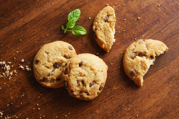 cookies with chocolate on a wooden background