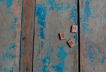runes on a wooden rustic background