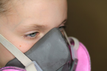 Little Girl With Respirator Mask On 