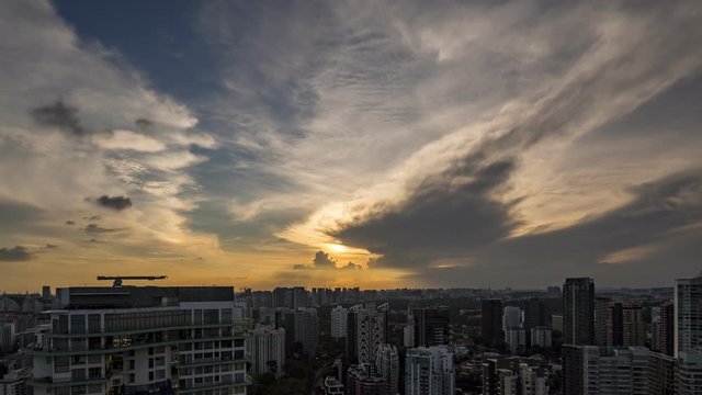 Time-lapse video of drifting cloud with Burning sunset at Singapore 