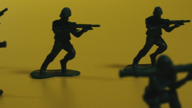Toy soldiers. Toy green soldiers with guns.