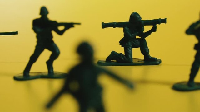 Toy soldiers. Toy green soldiers with guns.