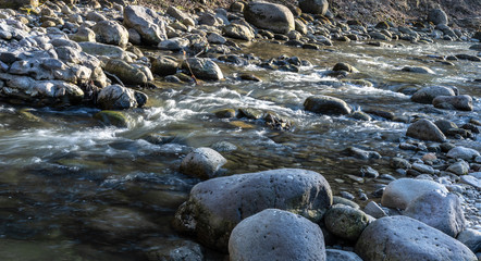 The flow of the river in the daytime