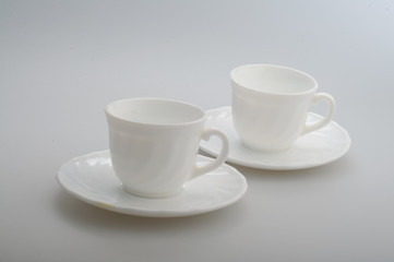 white cups on a white background