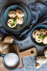 Coconut and ginger cookies topped with goji berry