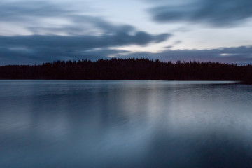 Fototapeta premium Beautiful sunset on the lake,natural background, long shutter speed