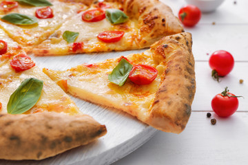 Delicious pizza Margherita on table, closeup