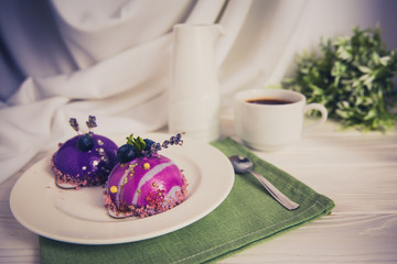 Still life with a cup of coffee and sweet cake