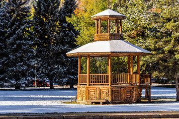 Aspen, USA small town in Colorado with snow covered wooden gazebo in Paepcke Park in morning