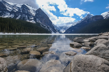 Fototapeta na wymiar Mount fairview, partly frozen lake, Lake Louise Banff National Park, Alberta Canada