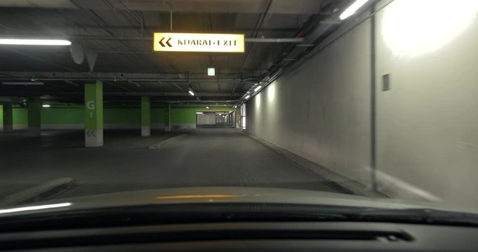 Underground parking lot, empty, no cars, free parking spaces
