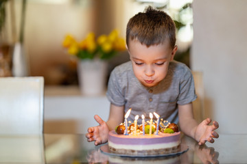 Adorable little boy celebrating birthday