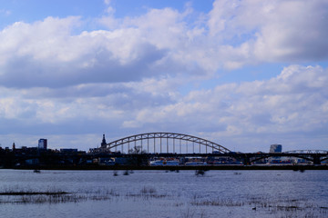 flooded river with the Waalbridge