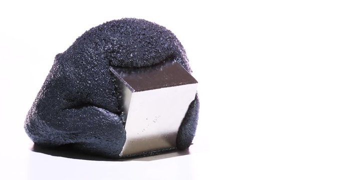 Magnetic Putty swallows a magnet in 4K | Science experiment in magnetism