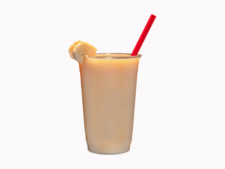 Blended ice Banana fruit smoothie drink with a red straw.