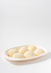 Fototapeta na wymiar A dish of Chinese bread on a white background