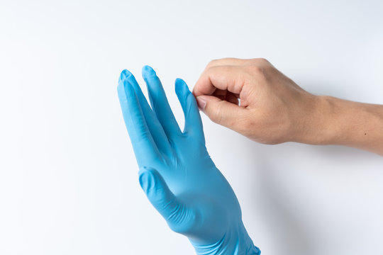 Hands are wearing nitrile gloves