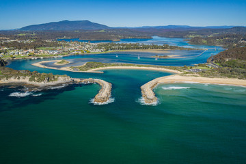 Aerial drone view of Wagonga Head and Wagonga Inlet at Narooma on the New South Wales South Coast, Australia, on a sunny day 