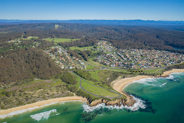 Aerial drone view of Kianga Point at Narooma on the New South Wales South Coast, Australia, on a sunny day  