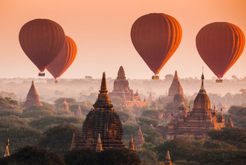Balloon over plain of Bagan in misty morning, Myanmar - obrazy, fototapety, plakaty