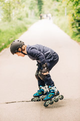 Little boy stuck in asphalt hole, kid falling with rollers