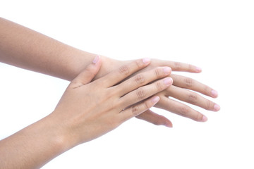 Girl's hand is rub backs of both hands isolated on white