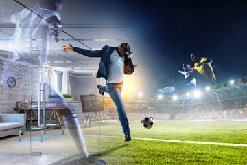 Virtual Reality headset on a black male playing soccer