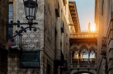 Cathedral of Barcelona in Las Ramblas at sunset and Famous Bridge of Sighs (Pont del Bisbe)