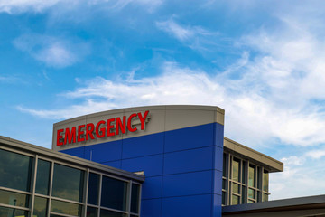 Emergency sign on building exterior