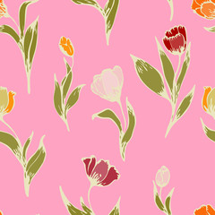 Multi-colored flowers and leaves of tulips on a light beige, peach background. Floral seamless pattern.