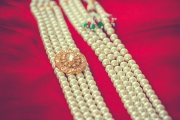 Indian Punjabi Sikh groom's wedding ritual jewellery close up