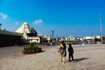 Infront of Puri Jagannath temple visitors walking and enjoying