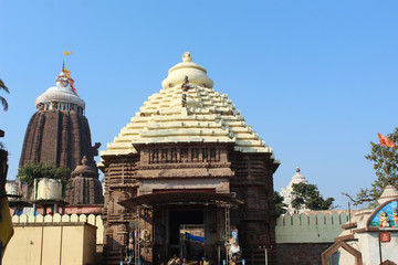 Sri jagannath temple puri south gate view closeup historical famous place with blue sky and trees in day light beautiful location wallpaper travel photography