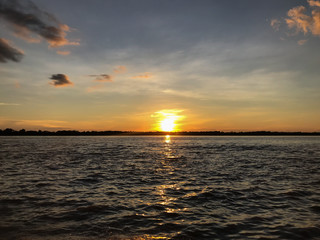 sunset over amazon river