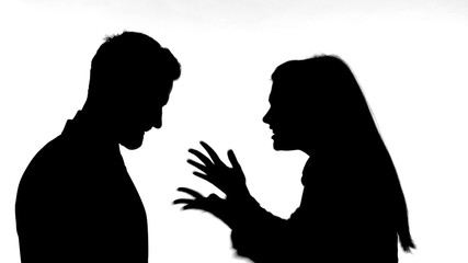 The Silhouette of Woman Fighting with Man against White Background