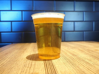 Close up shot of a cup of cold beer