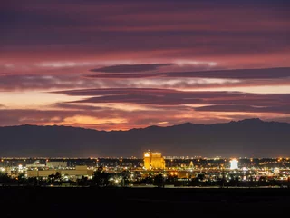 Zelfklevend Fotobehang Sunset red afterglow over the famous strip of Vegas © Kit Leong