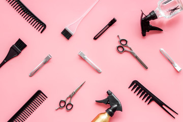 Beauty saloon concept. Hairdresser accessories pattern on pink background top-down