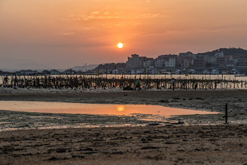 Fototapeta premium Dusk by the sea, sunset in the West
