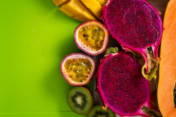 Exotic fruits on colored background