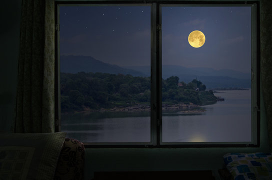 Beautiful Full Moon Over The River From Window View Point