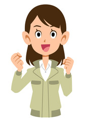 やる気のあるポーズの作業服を着た女性