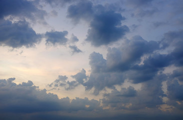 Fototapeta na wymiar Dark clouds before rain on blue sky background.