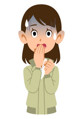 青ざめた表情の作業服を着た女性