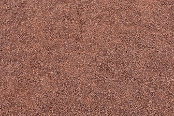 Fine gravel of dark and light brown color