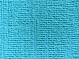 Texture of fabric painted with acrylic blue paint.
