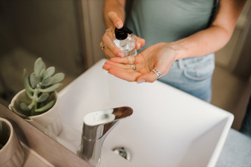 Corona Virus cleaning hands with soap and sanitiser 